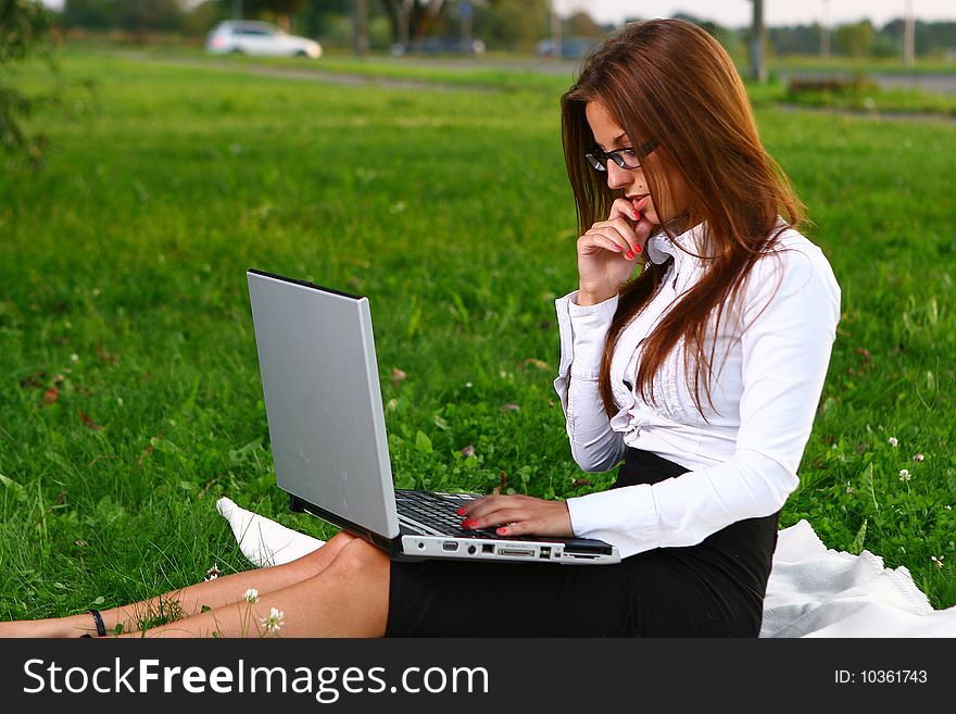 Beautiful Young Woman Studing In Park