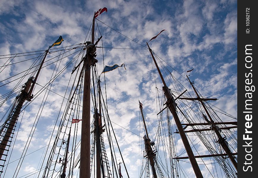 Sailing masts of traditional vintage wooden tall ships. Sailing masts of traditional vintage wooden tall ships