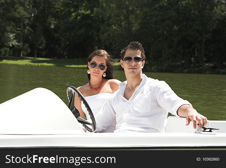 Lovley young attractive couple on a boat. Lovley young attractive couple on a boat