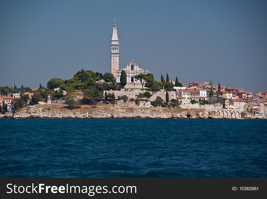 Rovinij - pearl of Istria in Croatia,and Cathedral of st. Euphemia. Photo taken from boat. Rovinij - pearl of Istria in Croatia,and Cathedral of st. Euphemia. Photo taken from boat.