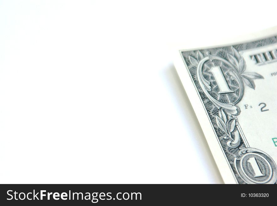 Small part of dollar on a white background