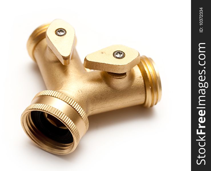 Hose splitter or Y made of brass on white background