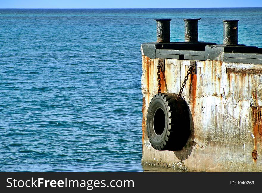 An old tyre used to protect any boats that come near to this pier. An old tyre used to protect any boats that come near to this pier