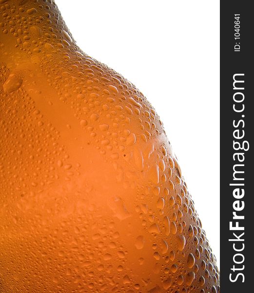 Macro of cold beer bottle with droplets