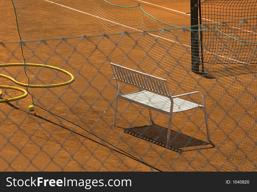 Tennis court in the sun