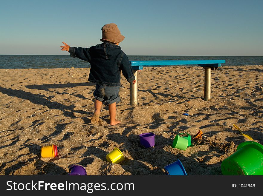 Little boy on the sea beach. Little boy on the sea beach.