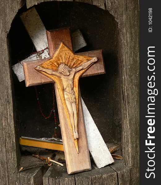 Figure of Jesus on a wooden cross. Figure of Jesus on a wooden cross