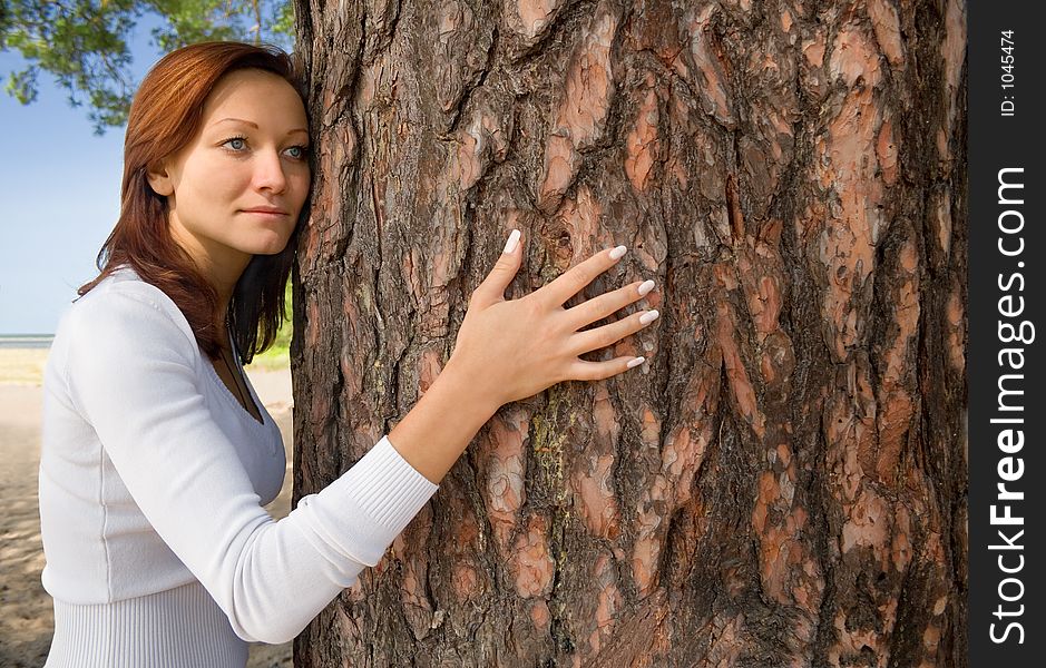 Girl On A Beach In A Shadow Of A Tree-1