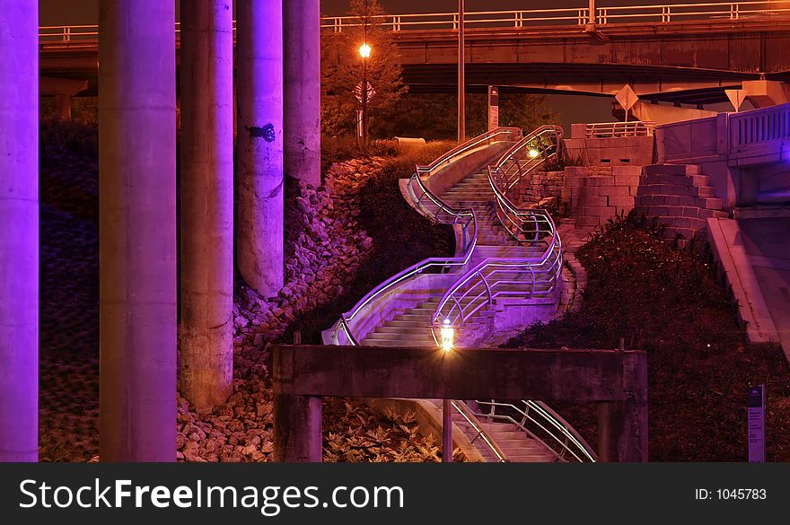 Stair to the bayou lit with purple light. Stair to the bayou lit with purple light