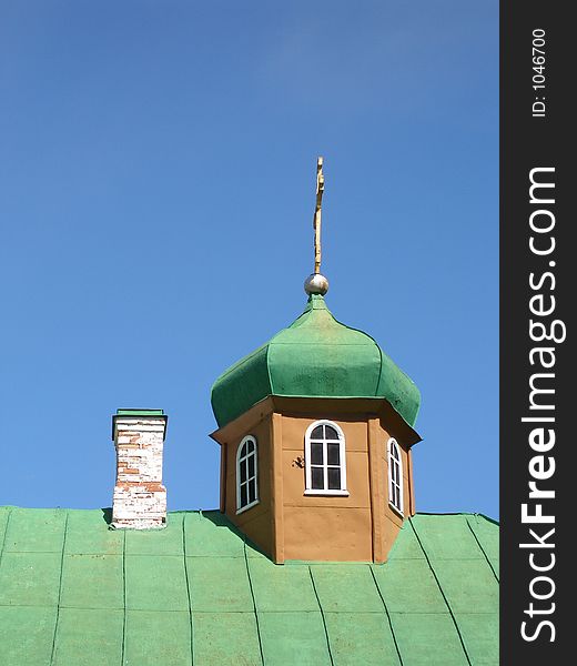 Church tower with a cross