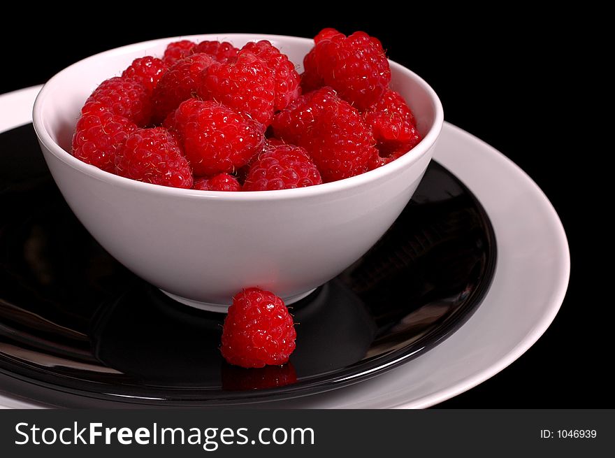 Luscious raspberries in white bowl. Luscious raspberries in white bowl