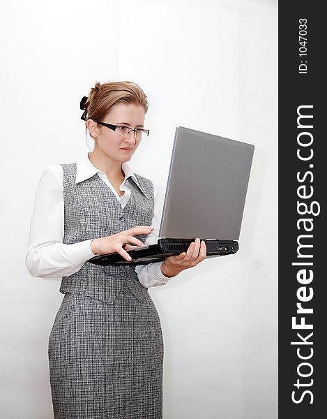 Young woman with notebook computer