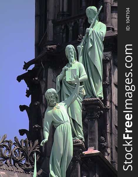 Bronze statues on a cathedral, Paris, France