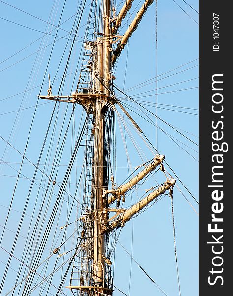 Sailboat's Main Mast with folded sails