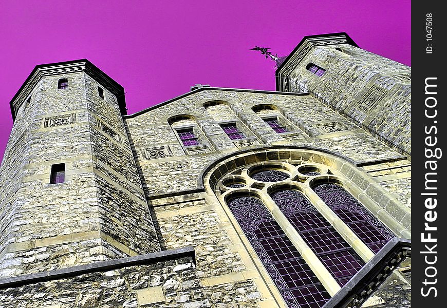 Church against catholic-purple background. Church against catholic-purple background