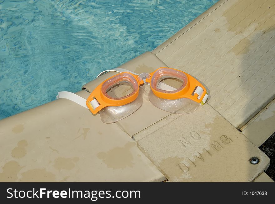 Pool Warning Sign and Goggles
