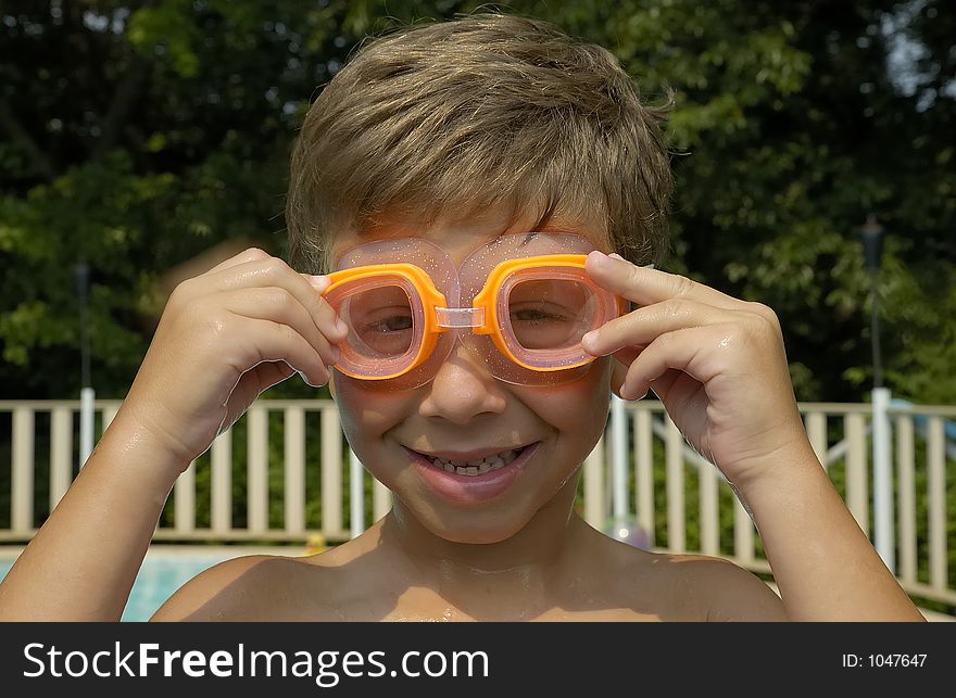 Child in a Swimmng Pool - Summer Fun Concept