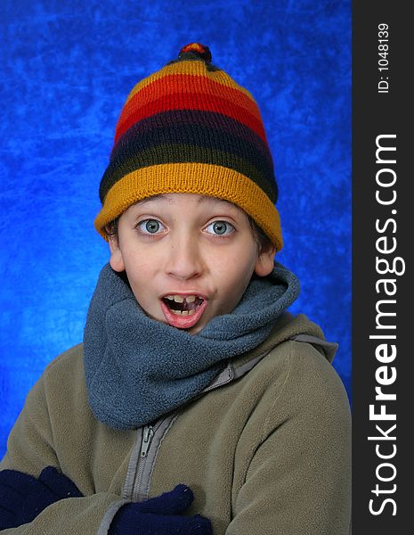 Boy doing fun expression in winter outfit. Look at my gallery for more winter images