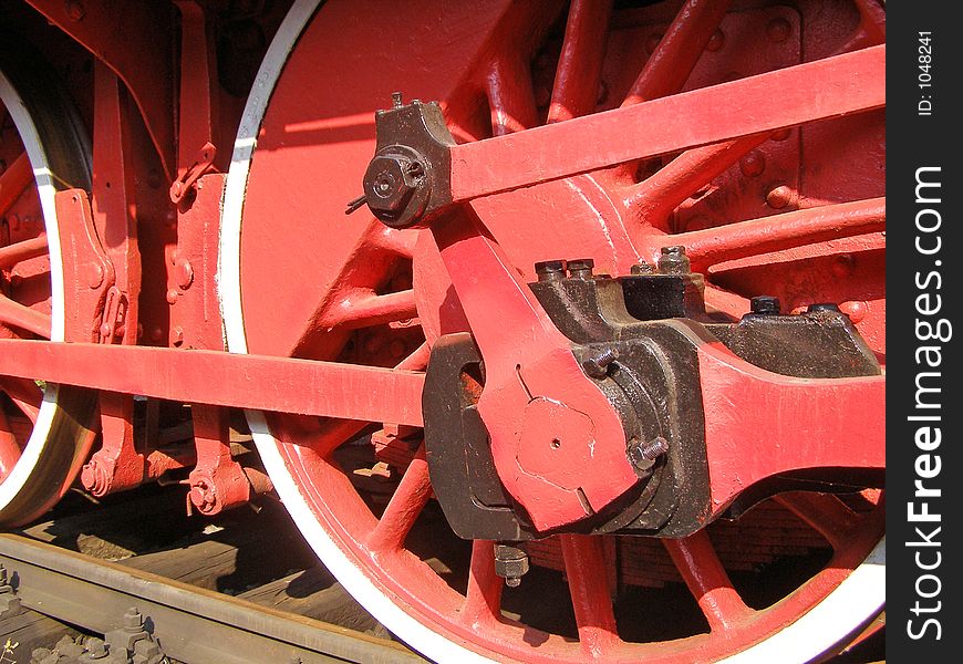 Old locomotive red steel wheels. Old locomotive red steel wheels