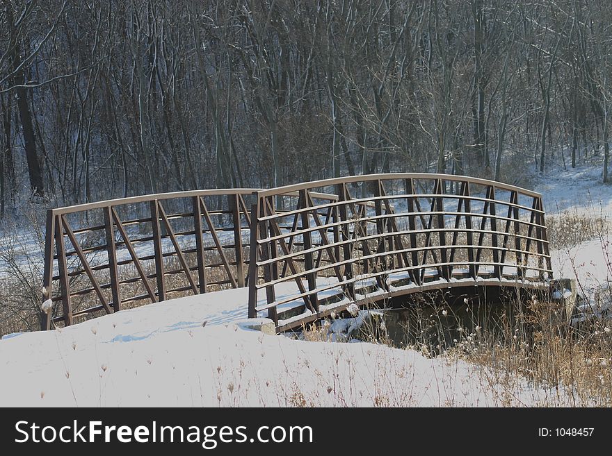 Snow covered steel bridge. Snow covered steel bridge