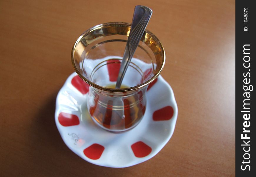 A glass of tea served with Turkish style