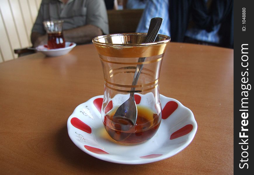 A glass of tea served with Turkish style