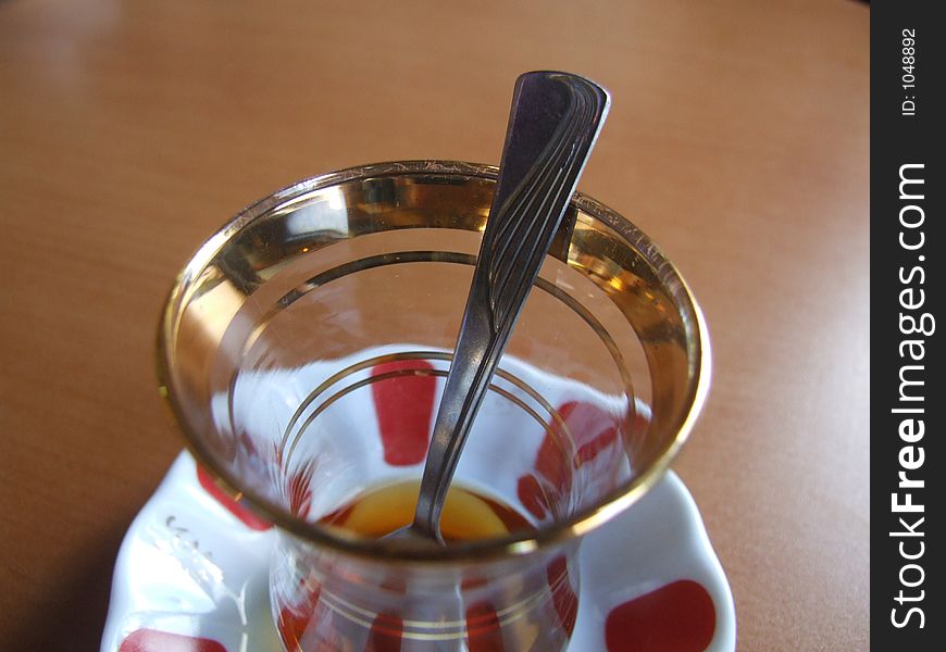 A glass of tea served in Turkish style