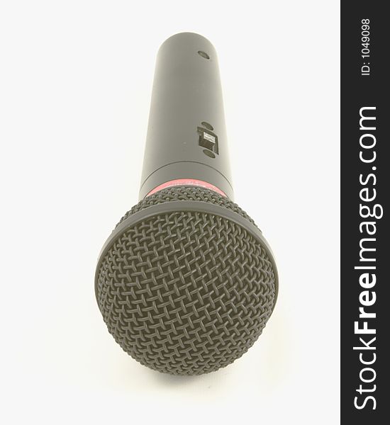 Black microphone on white background.