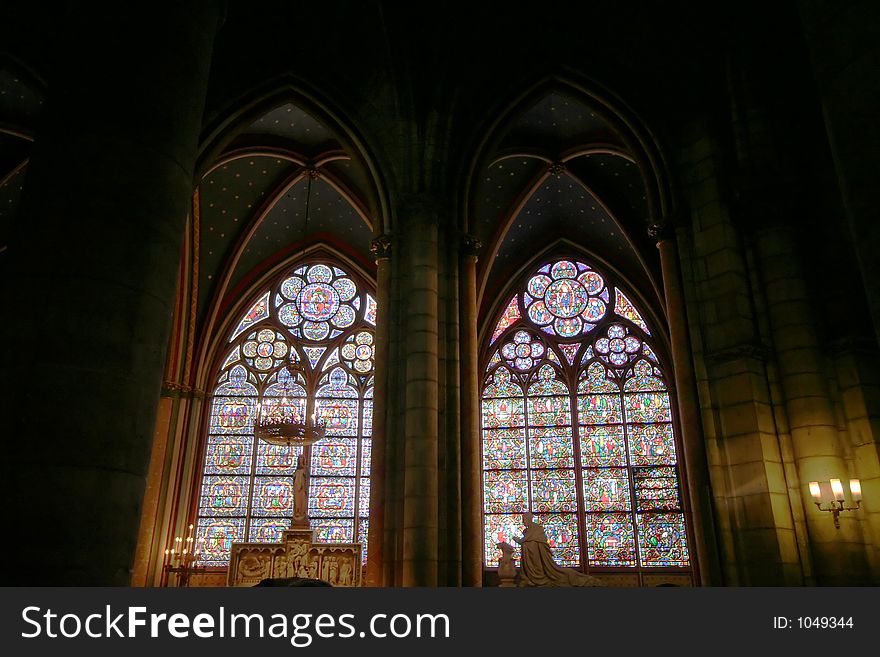 Two cathedral windows in Paris, France