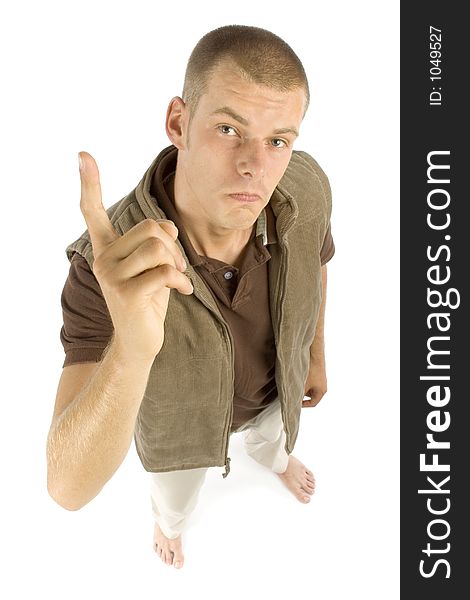 Young man standing - threaten by finger. Young man standing - threaten by finger