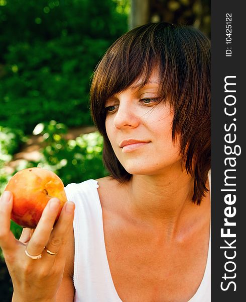 Woman And A Peach
