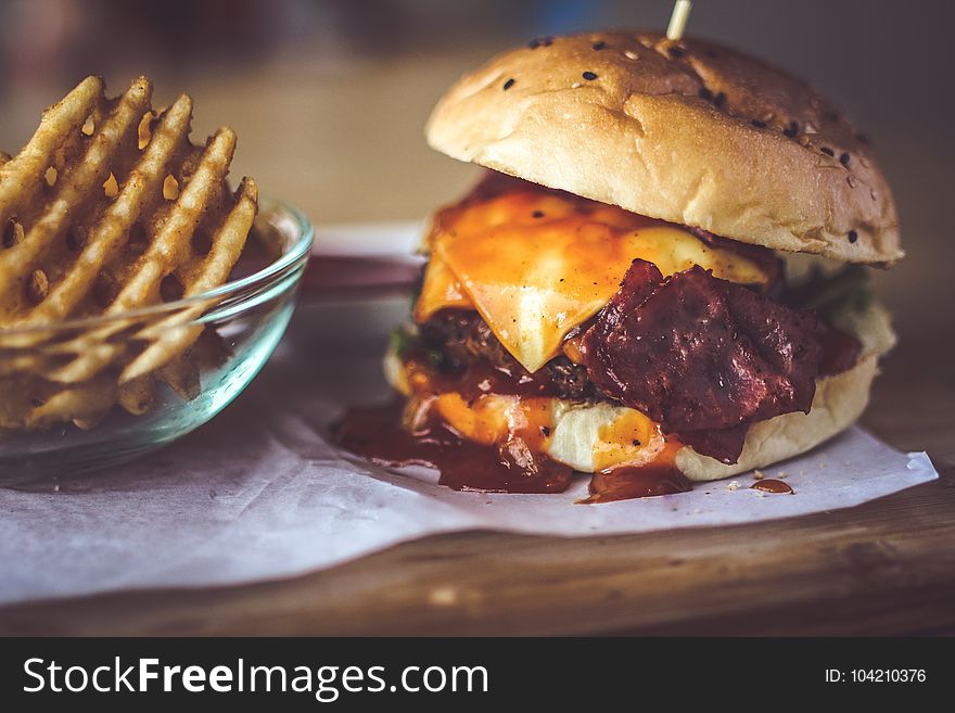 Closeup Photography of Bun With Cheese, Patty, Egg, and Bacon