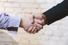 Business Deal Between Two Business Man Giving Handshake Stock Images