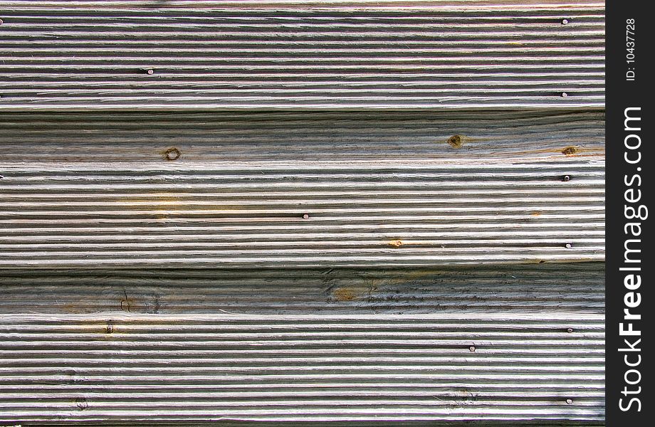 Plank background of old weathered wood. Plank background of old weathered wood