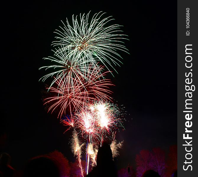 Photography Of Green And Red Fire Works Display