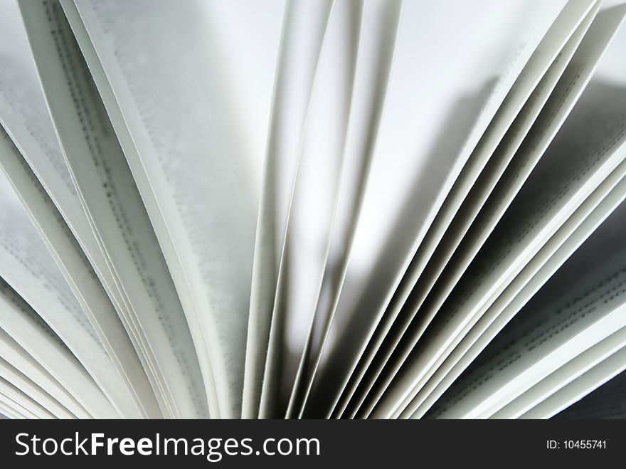 Closeup of book pages on a white background. Closeup of book pages on a white background
