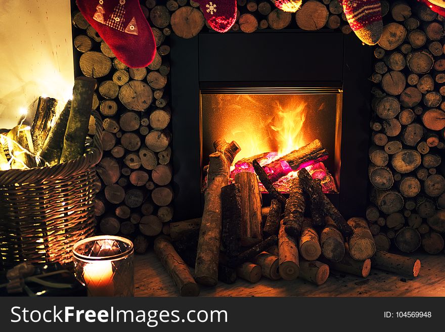 Brown Beside Fireplace Near Brown Wicker Basket