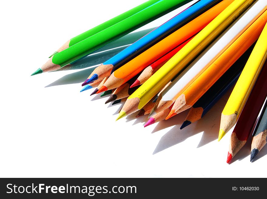 Isolated set of crayons spread on a white background. Isolated set of crayons spread on a white background