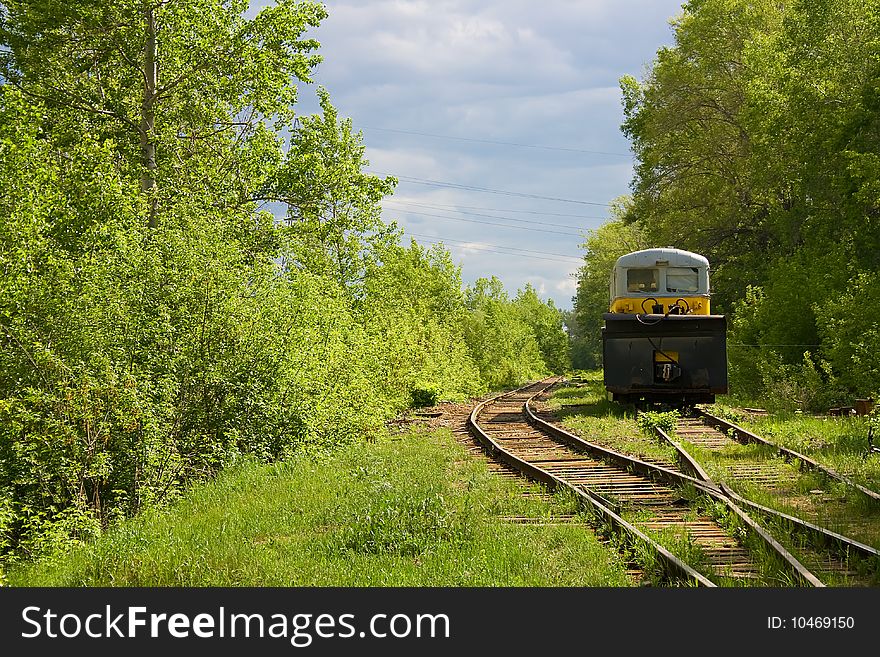 New great railroad symphony, summer scene of train and trees.