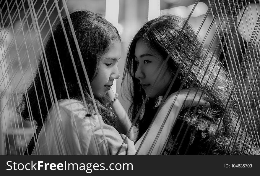 Grayscale Photography of Two Girls