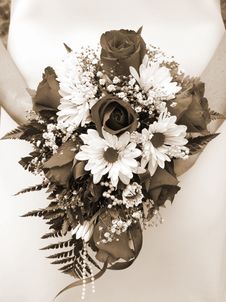 Bride Holding Her Wedding Bouquet Against Her Dress Stock Image Bride Holding Her Wedding Bouquet Against Her Dress Stock Image