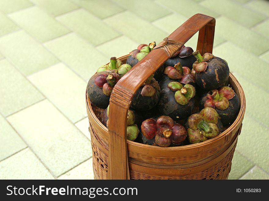 Basket of mangosteens