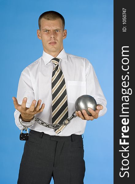 Businessman with ball and chain. Businessman with ball and chain
