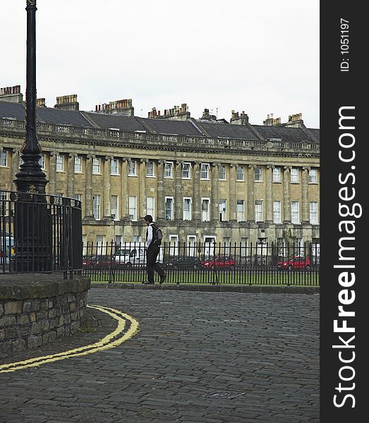 Pedestrian commuter near The Royal Crescent in Bath, England. Pedestrian commuter near The Royal Crescent in Bath, England.