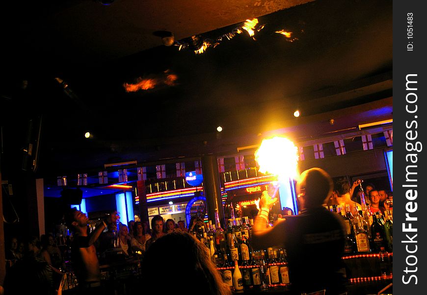 Barmen breathing fire at a nightclub in Zante, Greece. Barmen breathing fire at a nightclub in Zante, Greece.
