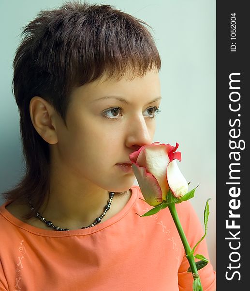 Pretty girl with rose