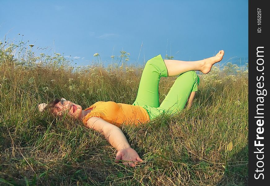 Girl reposes on grass. Girl reposes on grass