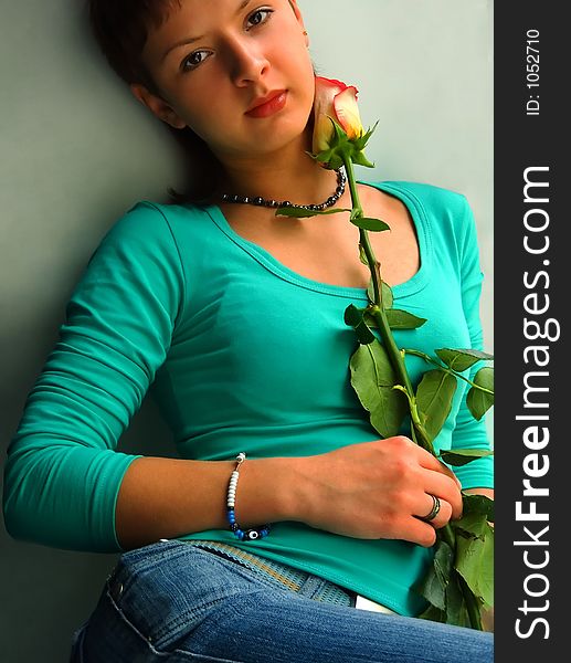 Pretty girl with rose