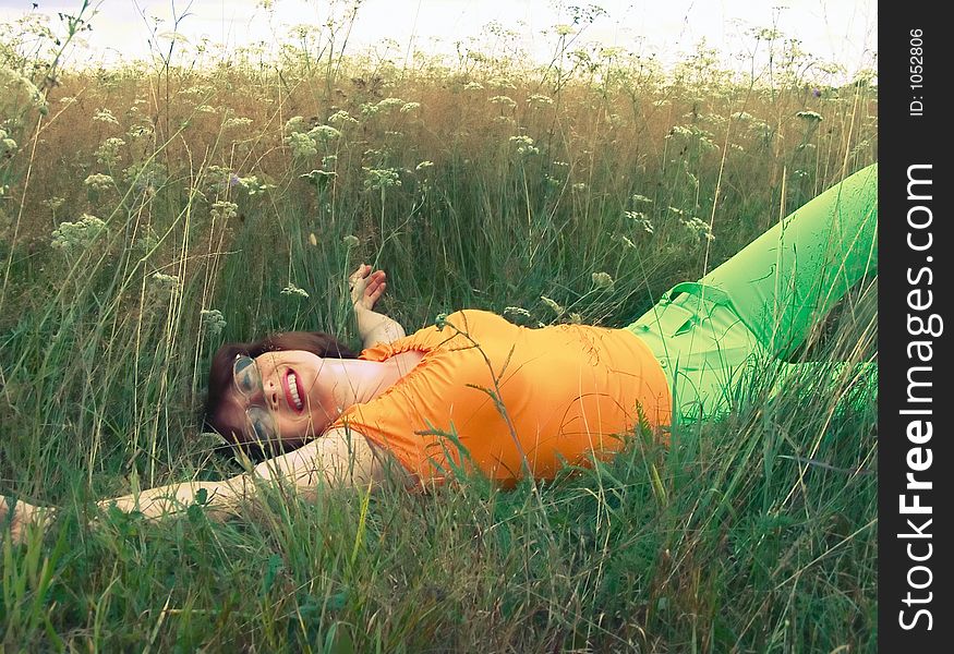 Girl reposes on grass. Girl reposes on grass