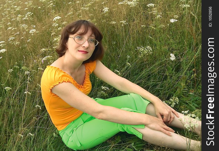 Girl reposes on grass. Girl reposes on grass